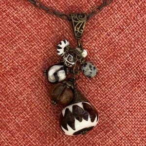 Unique long tribal style necklace in brown/ivory